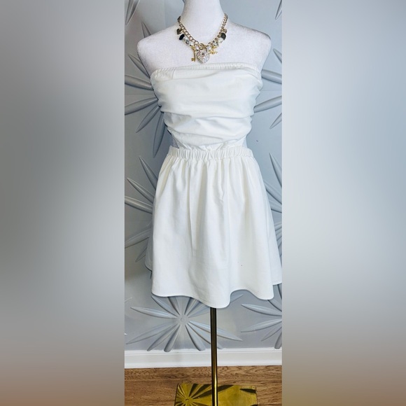 Petal & Pup Dresses & Skirts - HOST PICK Petal & Pup NWT SZ M white halter style dress w/cut outs. Bust 30”-36”